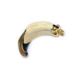 Colgante amoladera de jabalí